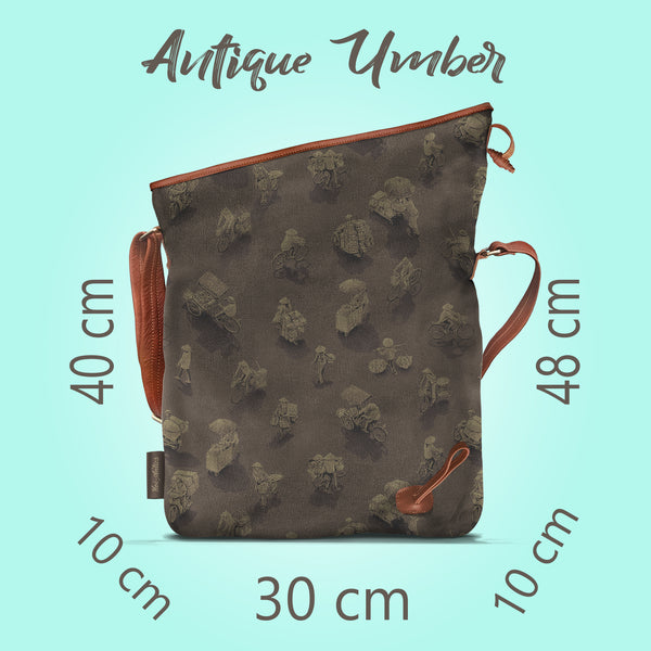 Front on view of a opened antique umber canvas and brown leather bag, with a pattern of people on bicycles and motorcycles, featuring Hoi-Antics brand logo. With text dimensions and color title.