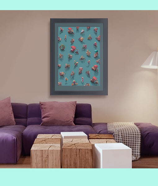 A Vietnamese street scene printed on fine art paper, framed and hanging on a wall in a lounge, with a pattern of people on bicycles and motorcycles.